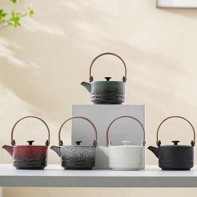 Élégante boîte à thé en céramique avec conception de poutre de levage durable et compacte