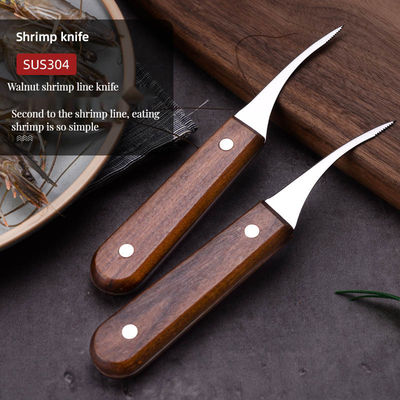 Préparation de fruits de mer sans effort avec un éplucheur de crevettes en acier inoxydable et un couteau à ventre de poisson