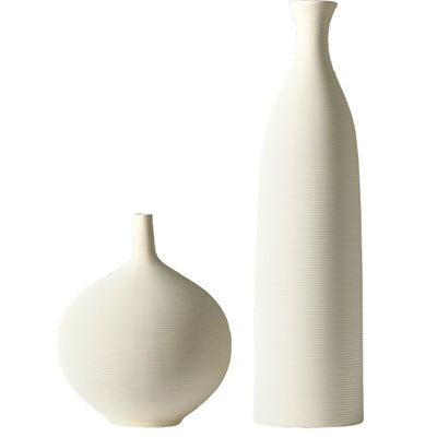 Vase en céramique blanche moderne et élégante pour la décoration du salon et les arrangements floraux frais