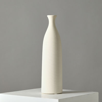 Vase en céramique blanche moderne et élégante pour la décoration du salon et les arrangements floraux frais