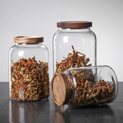Grand bocal en verre avec couvercle en bois La meilleure façon de conserver les assaisonnements dans la cuisine