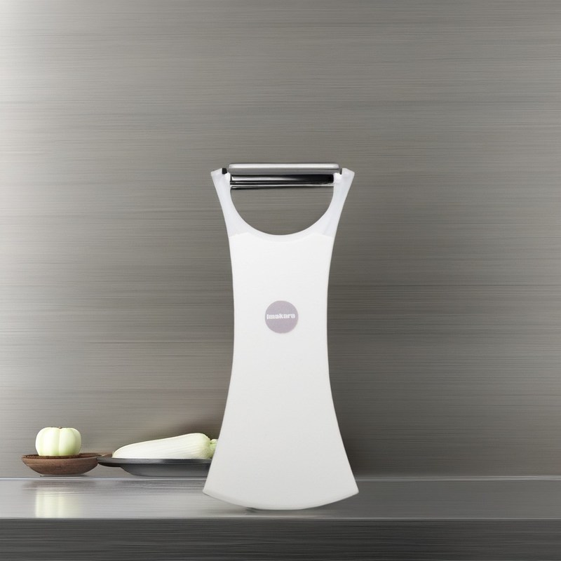 Outil polyvalent pour éplucher les fruits et légumes en acier inoxydable 2 en 1