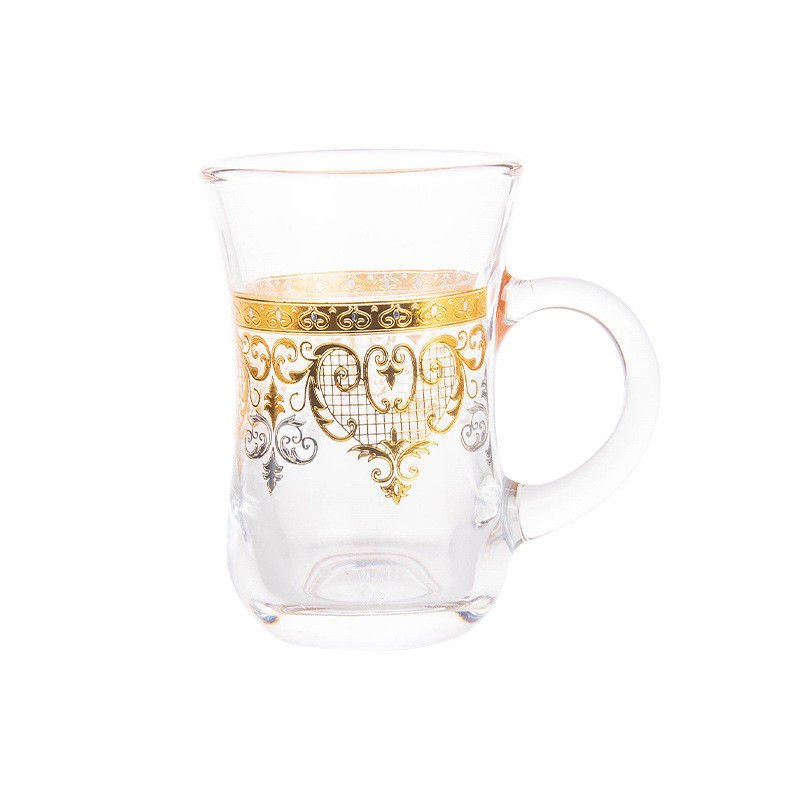 Une poignée en verre peinte en or et durable, une tasse de café, de lait et de thé, pour un intérieur de 12 pièces.